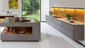 this is remmp german kitchen with a unique kitchen island the island recess has working drawers above a kitchen design modern family kitchen kitchen interior