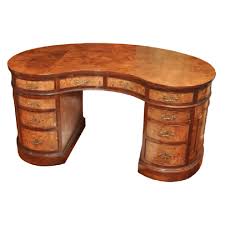 Myrtle burl kidney desk with antique blue brown leather and brass handles. James Kidney Desk Anomaly Living