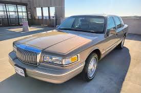 Image result for Light Cypress 1997 Town Car
