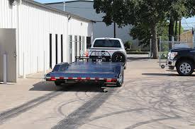 Our shelving system not only allows you to store things on top but with our monkey bars and hooks, you are able to hang just about. Gas Monkey Garage Trailer Pj Trailers