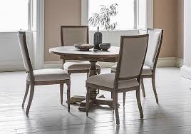 Carved oak dining table and chairs, shown here in a panelled room believed to date from the tudor period. Oak Dining Tables And Chairs Furniture Village