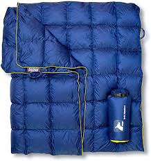 A 20d ripstop nylon shell blocks out wind and cold while 650 fill power down insulation keeps you cozy and warm inside. Festivals Stadium Travel Puffy Beach Ideal For Outdoors Lightweight And Warm 650 Fill Power Water Resistant Backpacking Quilt Packable Hammock Get Out Gear Down Camping Blanket Blankets Studiodarpan Outdoor Recreation