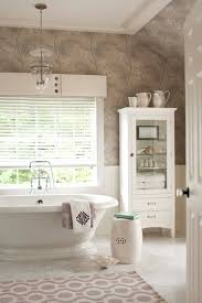 In this contemporary master bathroom, we really liked how the shower was put up above everything by a few small steps. Kiki S List The Zhush Transitional Bathroom Design Bathroom Inspiration Bathroom Design