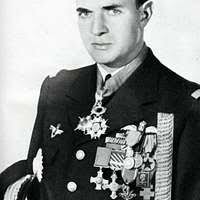 Rear Adm. Brent W. Scott, chaplain of the Marine Corps, gives the blessing  for the 25th Annual Blessing of the Fleets ceremony at the U.S. Navy  Memorial.