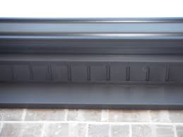 Soffit and fascia work simultaneously with your vinyl siding, seamlessly bridging the gap between your siding and your roofing. This Picture Shows The Aluminum Wrap Fascia Dark Bronze And The Vinyl Hidden Vent Soffit Dark Bronze Vinyl Soffit Exterior Soffit Ideas Exterior Soffit