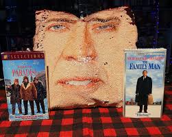 Christmas movie recommendations day 3.. Let's do a Nicolas Cage Christmas  double feature : First Trapped in Paradise (1994)- Residents of a friendly  Pennsylvania town foil three brothers' plan to rob a