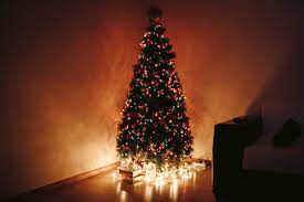 Christmas scene with tree gifts. Free Photo Photo Of Christmas Tree During Night Architecture Christmas Christmas Decorations Free Download Jooinn