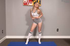 Melody Marks fucks a glass toy and pisses in a bowl after a workout photos