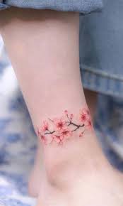 A reminder of transience, cherry blossom tattoos are a wonderful floral symbol that imbues love, beauty and the passing of time. 24 Best Cherry Blossom Tattoo For Women Bafbouf Anklet Tattoos Ankle Tattoo Small Ankle Tattoos For Women