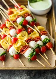 Pop a stick into each cheese ball and serve atop dried apple slices. Pasta Salad Skewers Inquiring Chef