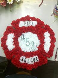 Flower crosses are the perfect way to express your thoughts of sympathy and let loved ones know you're thinking of them during this time of loss. Maltese Firefighter Cross Firefighter Cross Funeral Arrangements Funeral Flowers