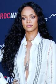 You can get defined curls by using a curling wand. 50 Best Rihanna Hairstyles Our Favorite Rihanna Hair Looks Of All Time