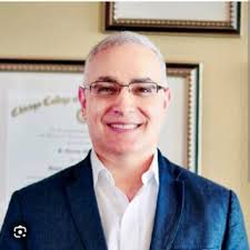 Dr. Joshua Merok, MD