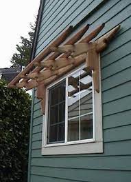 Trellis Over A Window Craftsman House Plans Craftsman Style House Plans House Exterior