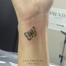 Little Yellow Butterfly Tattoo Made By Me At The Black Box Studio Yellow Butterfly Tattoo Butterfly Tattoo Butterfly Wrist Tattoo