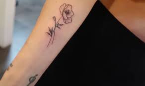 When u have a miscarriage there is no memorial or grave to visit. Scheana Shay Gets Poppy Flower Tattoo On Arm After Miscarriage Style Living