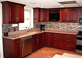 Floors are of engineered wood in mahogany, and for the backsplash, light beige ceramic tiles were used. Mahogany Blog Dba Custom Woodworking