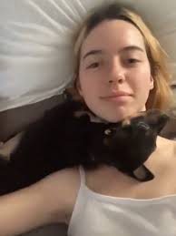 Girl Throwing Ball for Dog to Chase