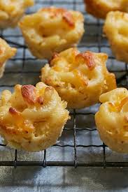 This is the easiest appetizer that always wins. The 65 Best Christmas Party Appetizers Hands Down No Contest Cheese Bites Recipe Mac And Cheese Bites Christmas Appetizers Party