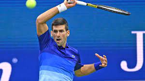Dusan lajovic lifts the trophy alongside team captain nenad zimonjic (left) and teammates novak djokovic (right) and nikola cacic (far right) after serbia's victory over spain in the atp cup 2020 final in sydney. Dbiqtsglayltam