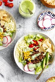 Fall in love with essential oil recipes by trying this healthy and delicious jalapeno and goat cheese hummus with cilantro and lime essential oil. Healthy Taco Salad With Creamy Cilantro Lime Dressing