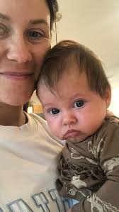 Boone has been sick and I haven't let him near Lily for a few days. He  missed her and was verrry happy to get to hold and sing to her this morning.