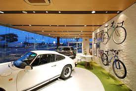 Used Car Dealership Inspired By Boutique Retailing In 2021 Car Showroom Design Car Dealership Car Dealership Design