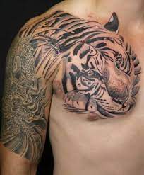 100 Best Tattoo Designs And Symbols For Men Women 2021 Chest Tattoos For Women Tribal Tattoos For Men Tribal Chest Tattoos