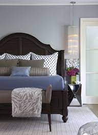 This Long Cylinder Style Fixture Is A Surprising Choice For This Bedroom It Adequately Fills This Very Dark Wood Bedroom Furniture Modern Bedroom Home Bedroom