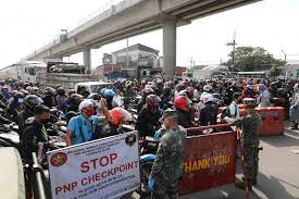 The second is an enhanced community quarantine, more akin to a total lockdown with hard borders. Enhanced Community Quarantine Checkpoint Photos Philippine News Agency