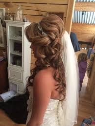 This Was A Beautiful Style For A Barn Wedding Long Wavy Curly Hair Accented With A Hea Wedding Hairstyles With Veil Diy Wedding Hair Trendy Wedding Hairstyles
