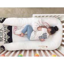 Dockatot Shop Our Deluxe And Grand Baby Dock Products Baby Nursery Toddler Bed Transition Toddler Gear