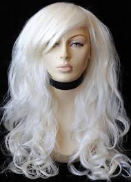Blonde wig with big loose curls and sweeping fringe, extra long: Carly