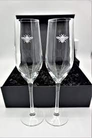 This napoleon bee 12 oz. Manchester Bee Champagne Glasses Gift Set Uniquely Manchester