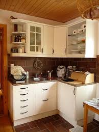 Stuff We Used White Kitchen Ikea Stat With Butterum Granite Countertop And Brown Tile Backsplash White Ikea Kitchen Kitchen Ikea Kitchen