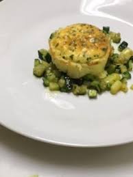 150 g di burro 100 di semola ¾ di latte intero e fresco 4 uova sode 300 g di fontina valdostana 30 g di grana grattugiato 5 uova pane grattugiato q.b. Valle Dell Acate Egg Souffle Seasoned With Chives