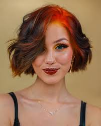 Orange hair through the years! 🎉🍊🔥 Which rendition would you like to try  one day? #OrangeHairColour #CoralHair #hairdye