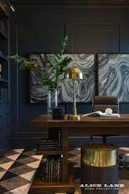 Masculine Home Office Paint Ideas We Recommend A Deep Blue Paint And Classic Black And White Home Office Design Masculine Home Offices Home Office Paint Ideas