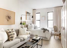 The designers at lablstudio chiseled out separate spots for sleeping, working, and entertaining by dividing the single room apartment in half. Studio Apartment Interior Design Tips And Layout Ideas Apartment Interior Design Apartment Interior Small Room Design