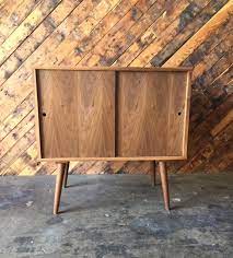 We did not find results for: Mid Century Style Custom Walnut Bar Record Cabinet With Sliding Doors The Hunt Vintage