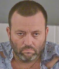 Parolee who dove out of window in standoff transferred from hospital to  jail