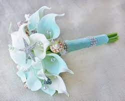 Deposit on bridal brooch bouquet package beach wedding purple teal and silver broach bouqet turquoise aqua eggplant blue lavender $1,118.48 deposit on custom brooch bouquet wedding 11 piece package beach wedding aqua ivory pearls blue white starfish bridesmaid bouquet boutonniere $435.00 full price bridal brooch bouquet wedding package free shipping custom made purple teal turquoise crystal. Pin On Beach Wedding