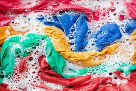 Separate the clothes according to color. Color Clothes Soak In Water With Washing Powder Before Washing Stock Photo Picture And Royalty Free Image Image 100581113