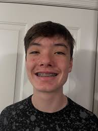 Not the best pictures but Logan caught a Dekay's Brown snake after his game  tonight.