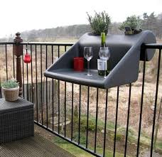 Space Saving Hanging Table Adding Comfort To Small Balcony Designs Small Balcony Design Balcony Decor Small Balcony