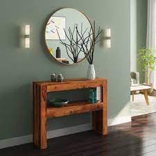 As a highly durable material, the woods used to design these pieces are usually popular hardwoods like oak, maple, and beech or softwoods like pine or cedar. Epsilon Console Table Urban Ladder