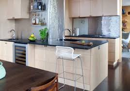 The mirror is probably glued to the wall surface. 10 Top Trends In Kitchen Backsplash Design For 2021 Luxury Home Remodeling Sebring Design Build