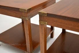 This is very well made and is a great size. Antiques Atlas Military Campaign Style Mahogany Coffee Tables