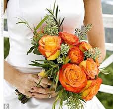 Peonies, roses, tulips, calla lilies, hydrangeas, sweet pea, and ranunculus are just a few of the. Real Weddings Mackenzie Bradley An Outdoor Wedding In Pisgah Al The Bri Orange Rose Bouquet Simple Bridal Bouquets Bridal Bouquet
