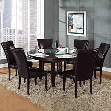 Our dining furniture options have you covered, no matter the size and layout of your room or how many people you need to seat. Steve Silver Co Holbrook 7 Pc Dining Set Round Dining Room Table Round Dining Room Round Dining Table Sets